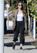 Jessica Biel seen wearing a houndstooth blazer over a white top as she steps out in Los Angeles