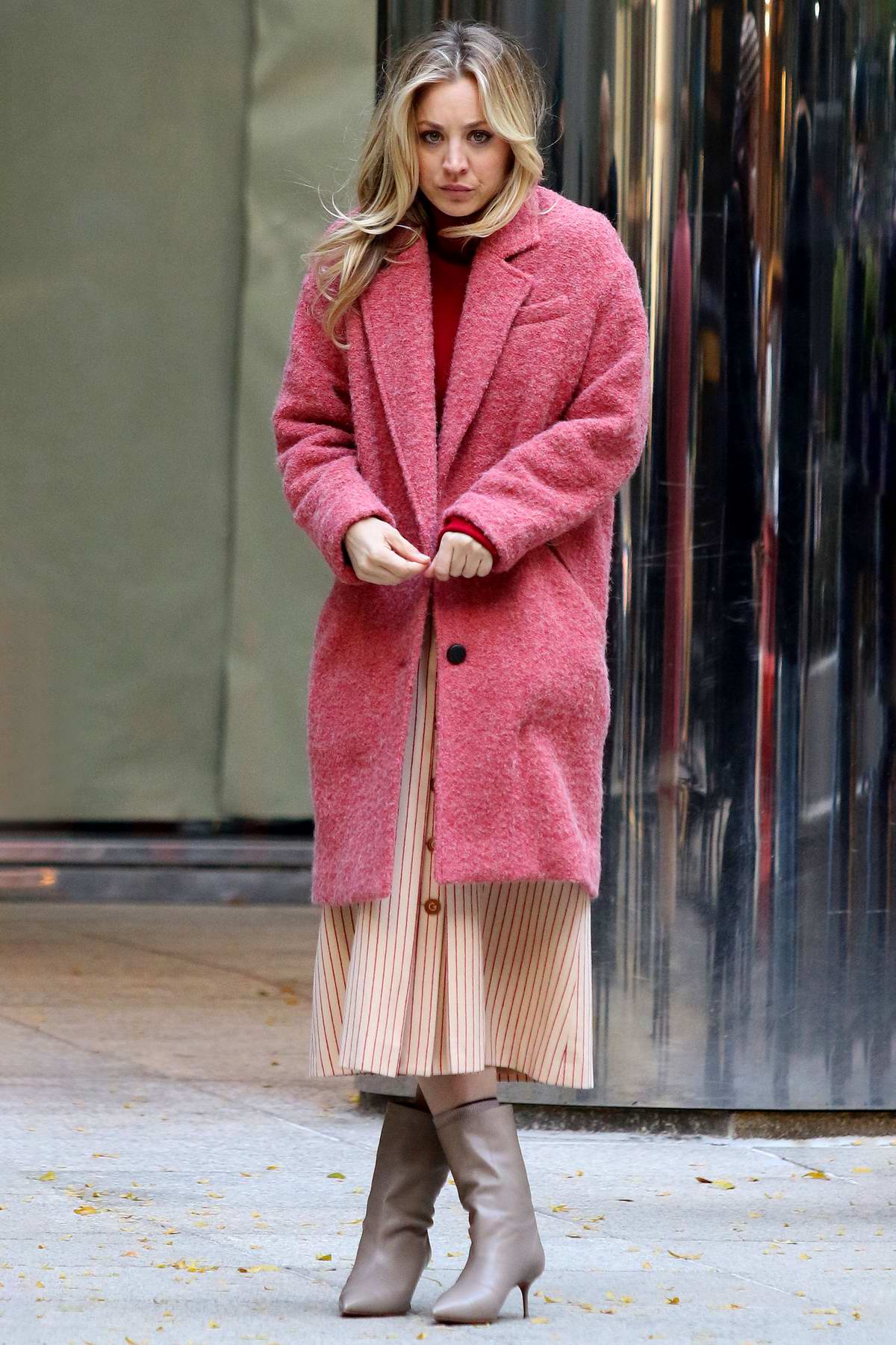 Kaley Cuoco Seen Wearing A Pink Coat On The Set Of The