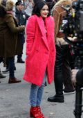 Lucy Hale looks cute in a pink fur coat while filming scenes at the 'Katy Keene' set in Long Island City in Queens, New York
