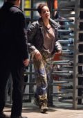 Halsey wears tie-dye sweatpants as she and Evan Peters arrive at JFK Airport in New York City