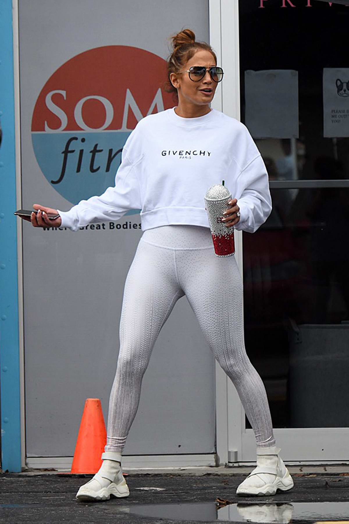 jennifer lopez sports all-white as she arrives at the gym in miami