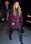 Jennifer Lopez wears a big smile and an oversized flannel coat to the SNL cast dinner in New York City