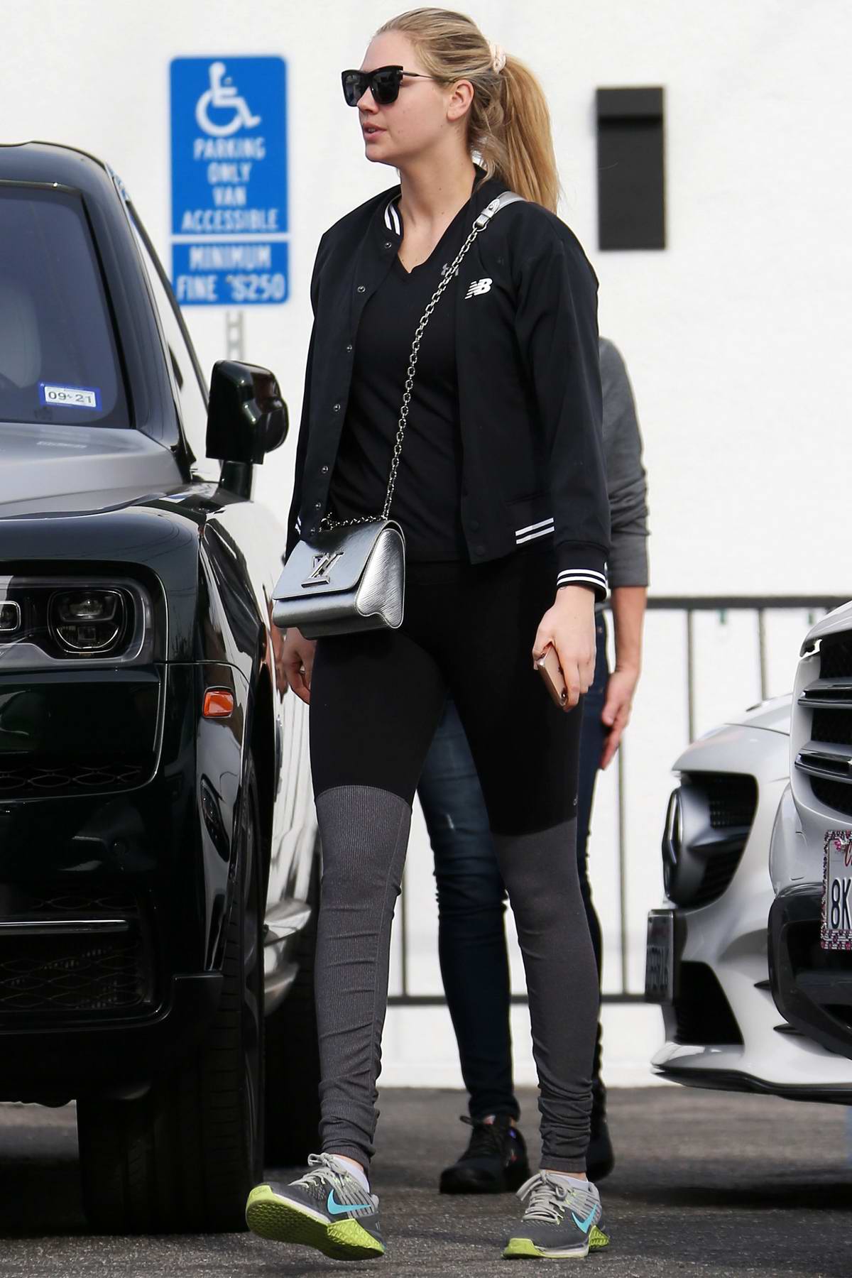 kate upton rocks 'new balance' jacket and two-toned leggings while out ...