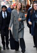 Olivia Wilde looks slick in a long grey coat at the Directors Guild of America in New York City