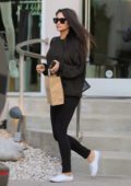 Shay Mitchell looks great in a dark sweater and black jeans as she leaves a beauty salon in West Hollywood, Los Angeles
