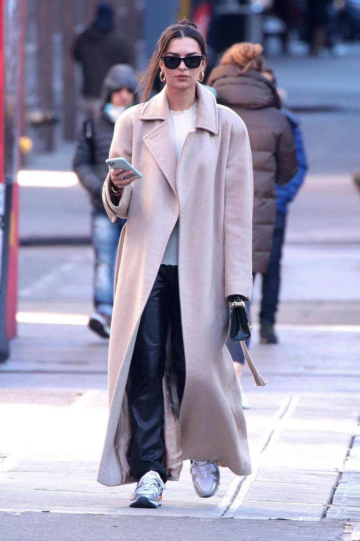 emily ratajkowski wears a trench coat as she steps out to run some ...