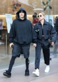 Hailey Bieber and Justin Bieber sport matching outfits while out for some shopping at the Grove in Los Angeles