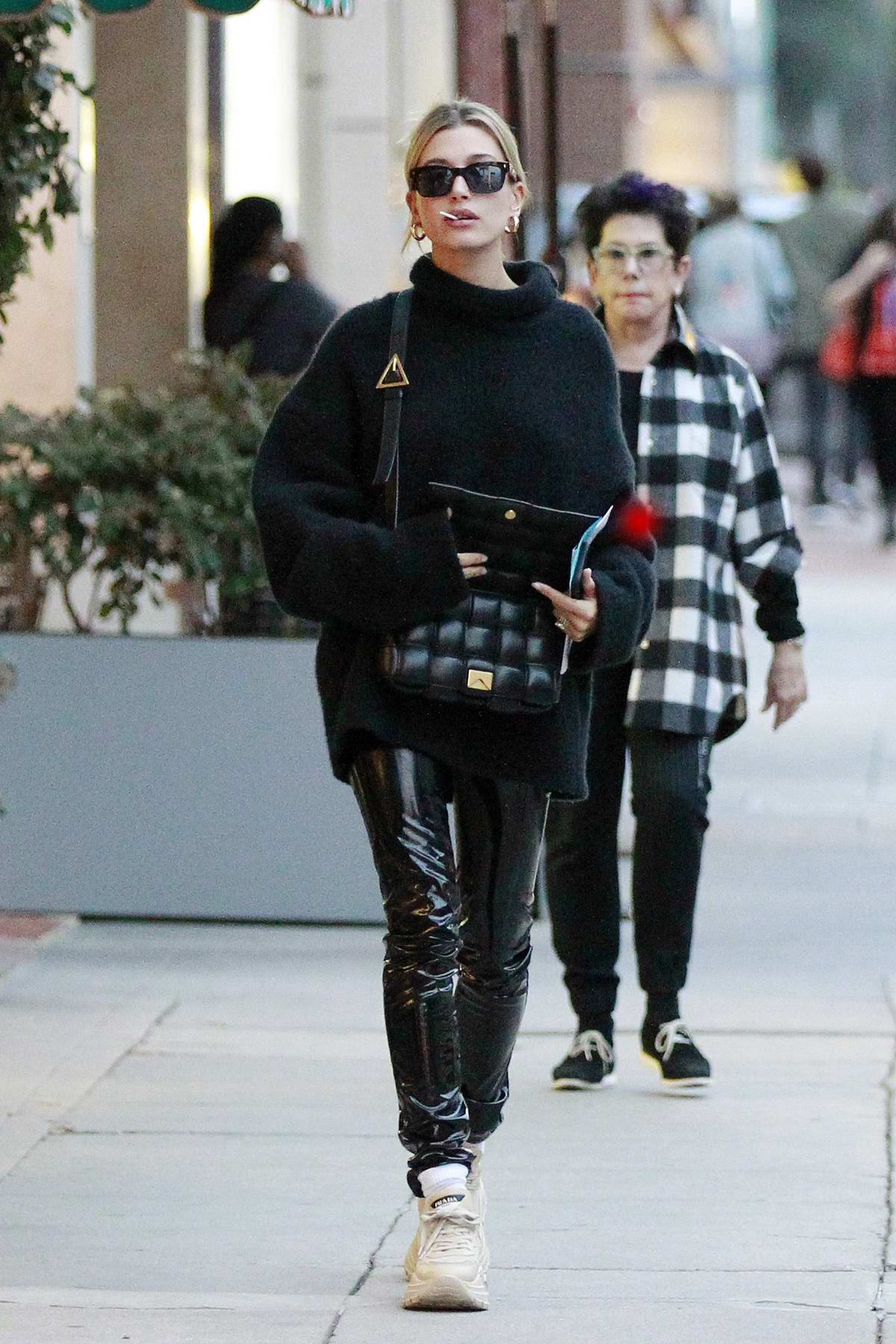 hailey bieber seen wearing black pvc pants balenciaga out with a friend in los angeles-200120_7