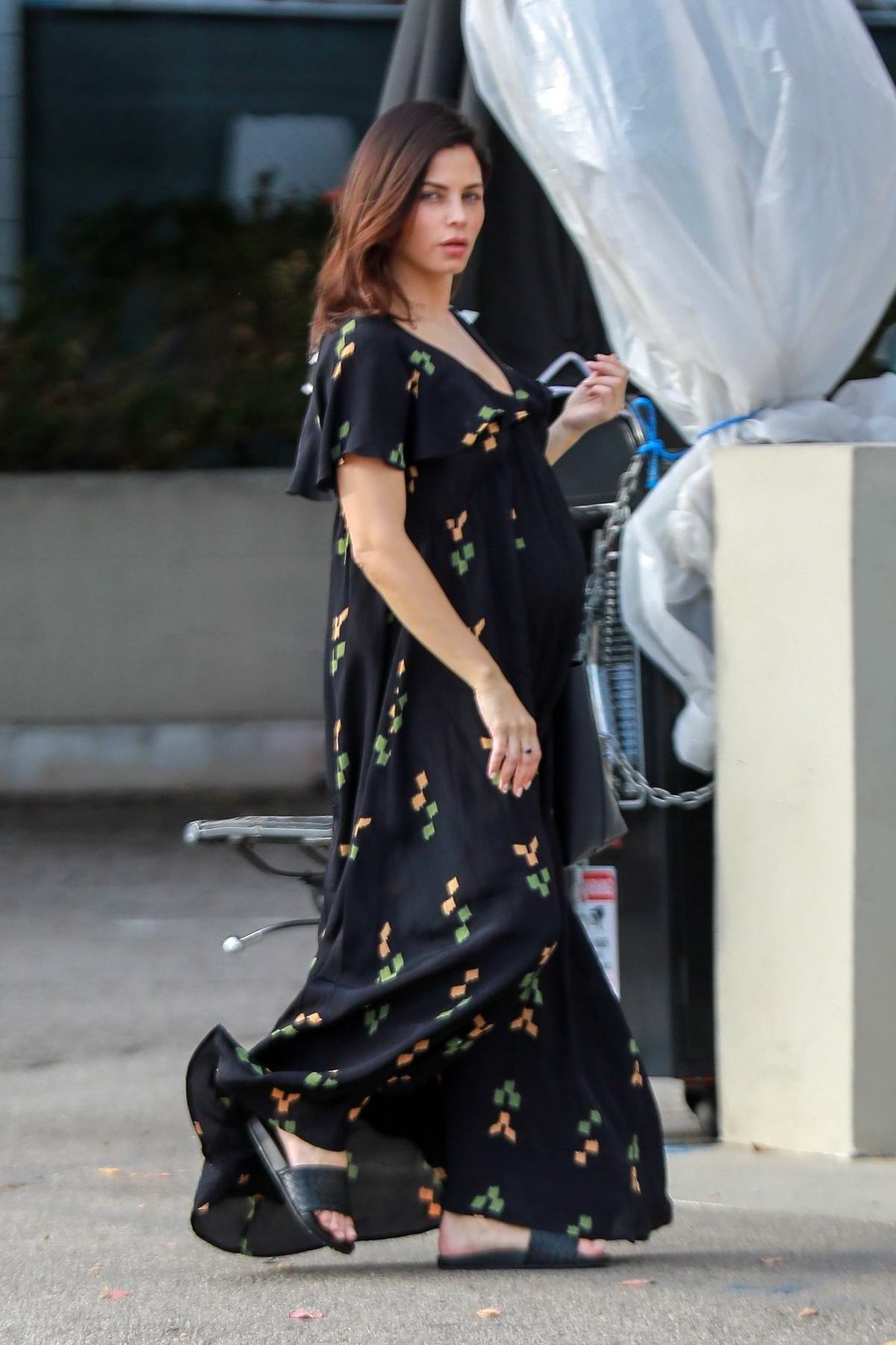 Sofia Vergara looks lovely in a floral print dress as she arrives at a  taping for