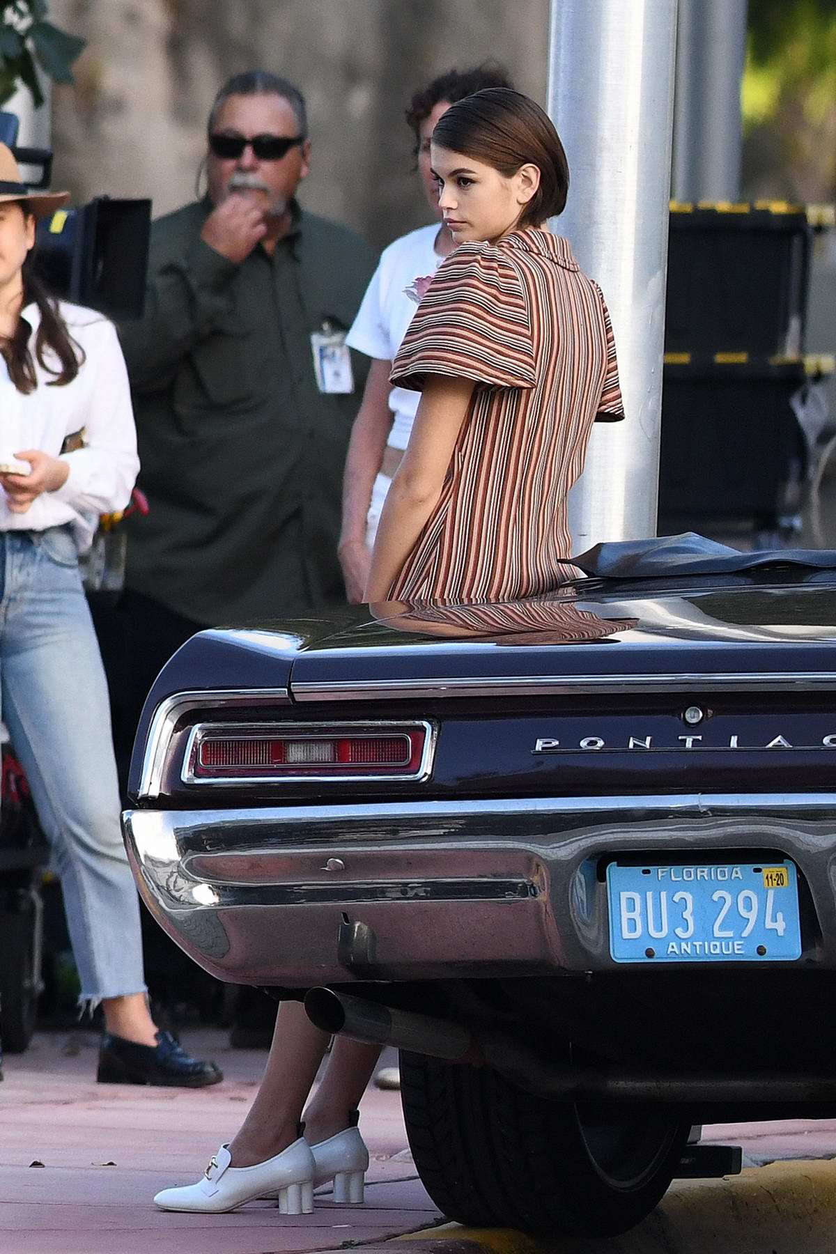 kaia gerber seen during a louis vuitton photoshoot on the beach in