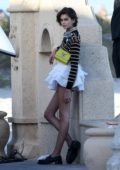 Kaia Gerber looks fashionable in multiple outfits during a Louis Vuitton  photoshoot in Miami Beach, California