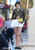 Kaia Gerber shows off her mile-long legs during day 3 of Louis Vuitton photoshoot in Miami, Florida