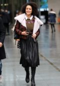 Nathalie Emmanuel smiles for the camera as she leaves the BBC Studios in London, UK