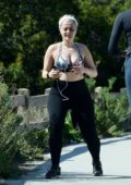 Bebe Rexha seen wearing sports bra and leggings during a workout session  with a personal trainer in Los Angeles
