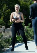 Bebe Rexha seen wearing sports bra and leggings during a workout session with a personal trainer in Los Angeles