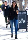 Eiza Gonzalez wears a black crop top and high-waisted jeans while making a  coffee run