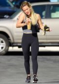 Sara Sampaio sports bright red leggings as she grabs drinks after her  workout at the Dogpound