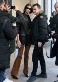 Kaia Gerber greets fans as she leaves her hotel during Milan Fashion Week 2020 in Milan, Italy