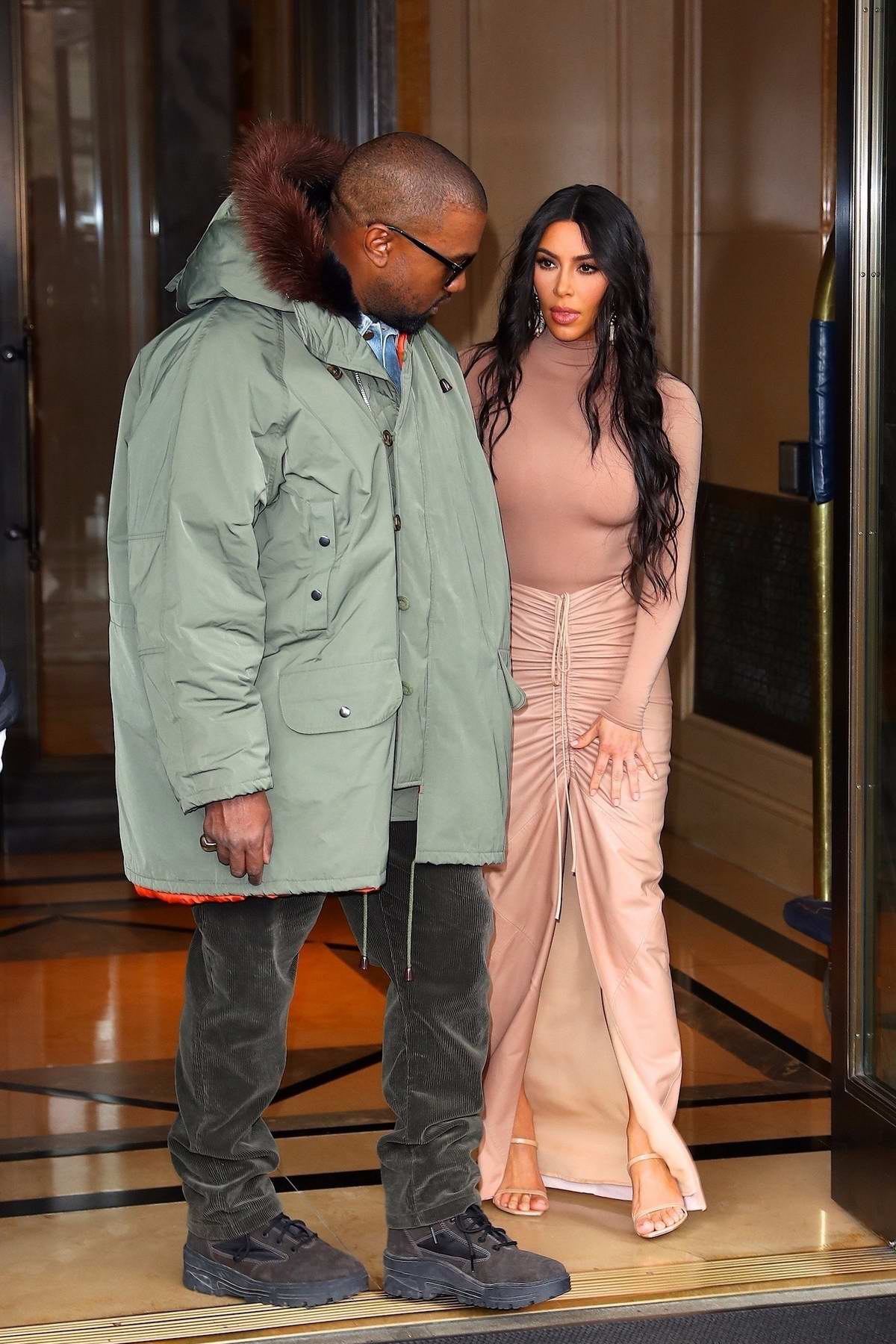 Kim Kardashian and Kanye West leave their hotel and head to the SKIMS  launch event at
