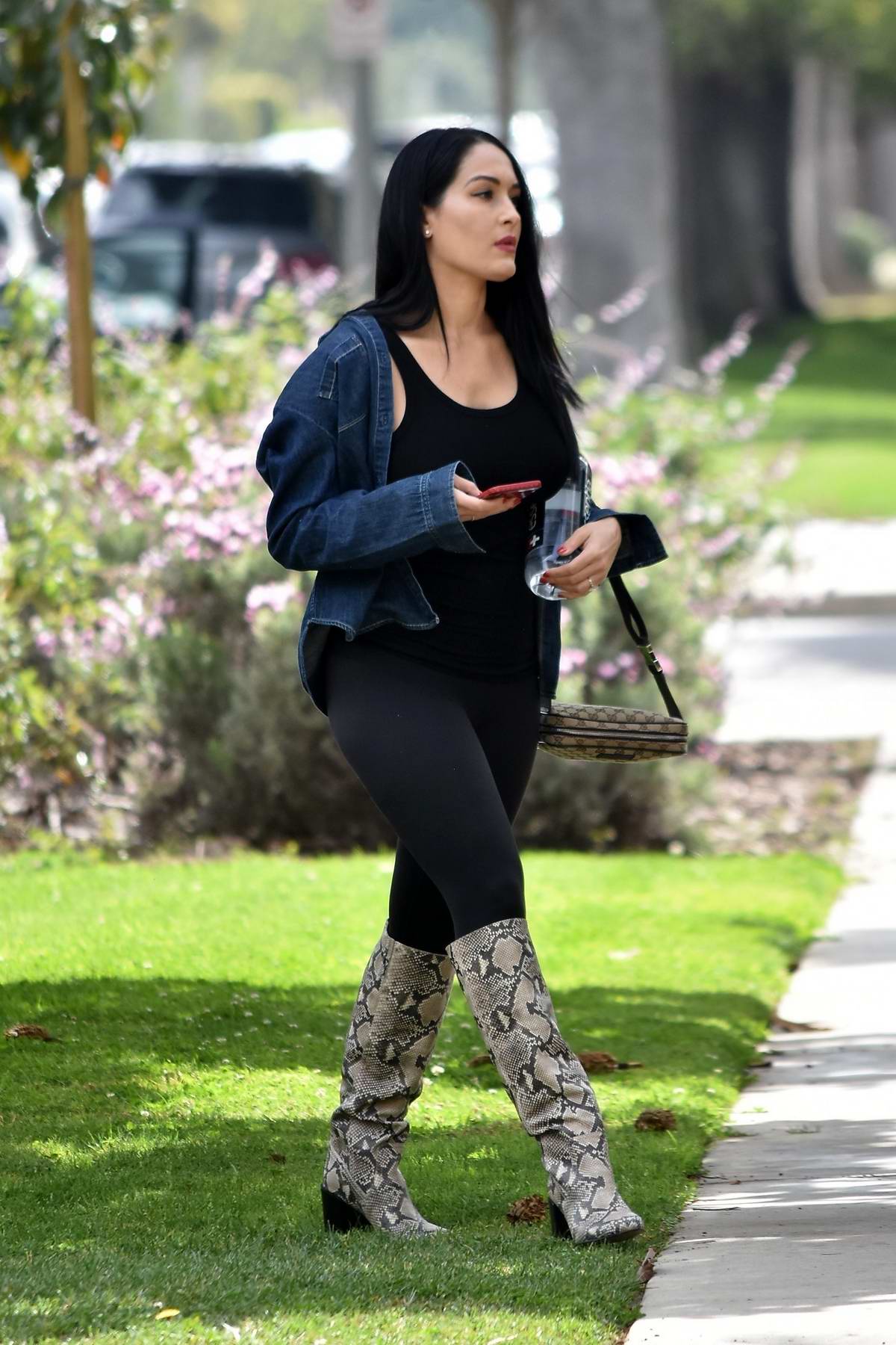 nikki bella rocks a black spandex jumpsuit and snakeskin boots while  visiting a friend in brentwood, california-290220_7