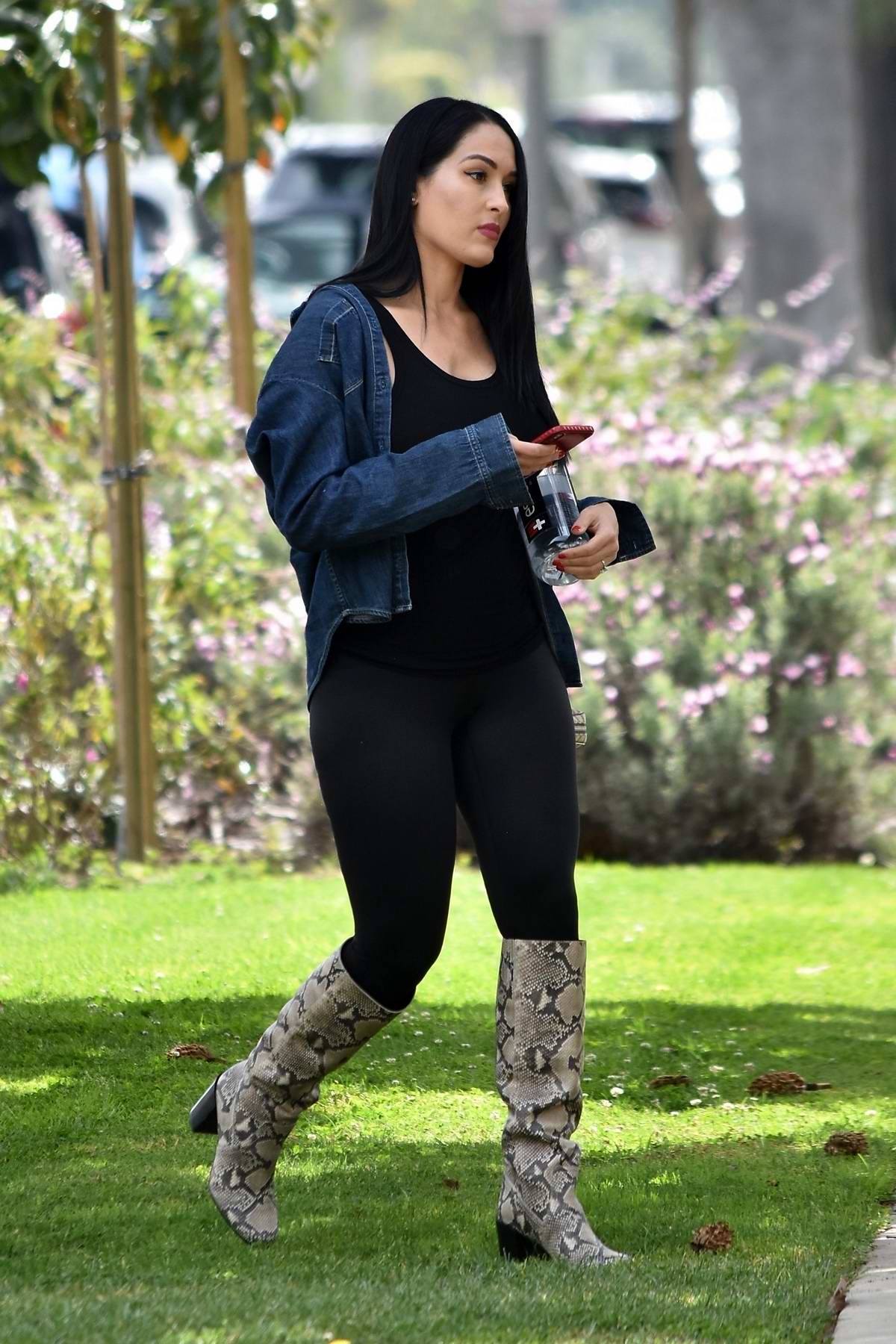 nikki bella rocks a black spandex jumpsuit and snakeskin boots while  visiting a friend in brentwood, california-290220_7