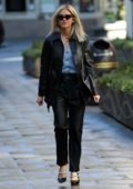 Ashley Roberts seen wearing black leather jacket with matching trousers as she arrives at Global Radio in London, UK