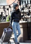 jennifer connelly bundles up in a black beanie, matching jacket, jeans, and  nike trainer while out in new york city-100320_4