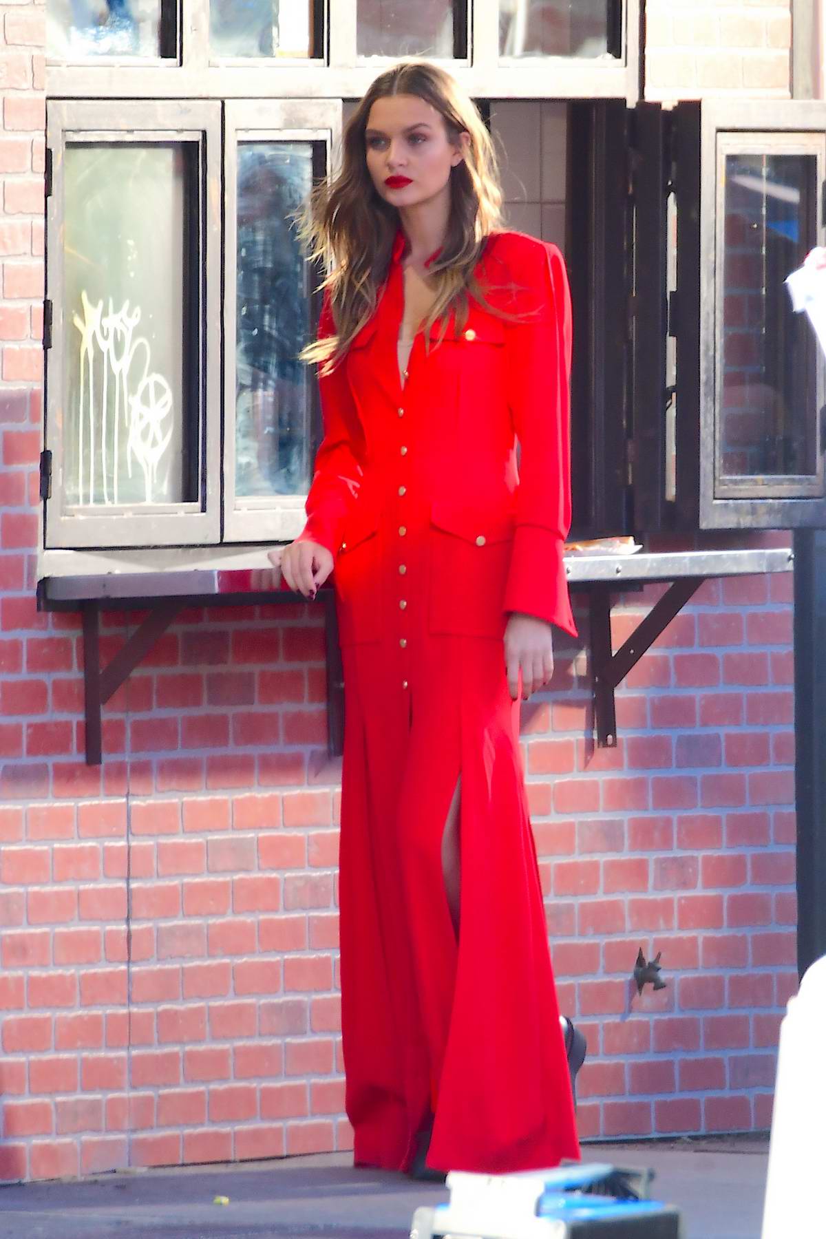 josephine skriver looks gorgeous in red while filming a maybelline ...