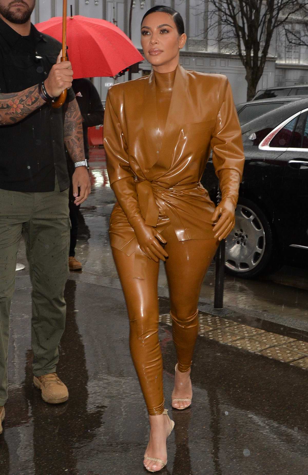 Kim Kardashian Went to Kanye West's Paris Sunday Service in a Balmain Latex  Suit