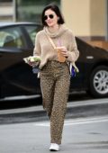 Lucy Hale looks pretty in a knitted sweater and animal print pants while out for an iced coffee in Los Angeles