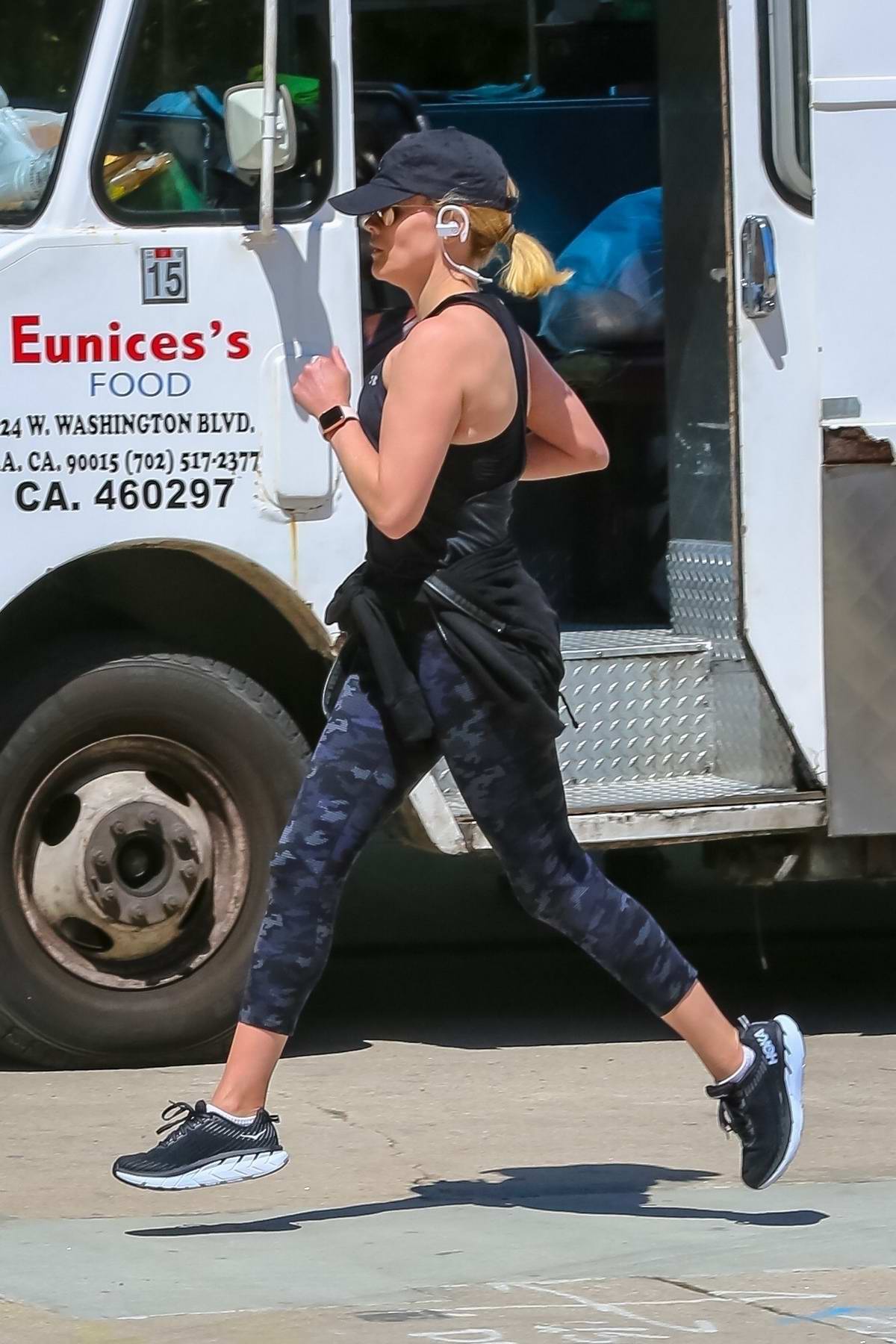 Reese Witherspoon Goes Running in Leggings + Hoka One One Sneakers