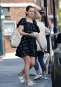 Alice Eve looks cute in a monochrome mini dress while out running errands in London, UK