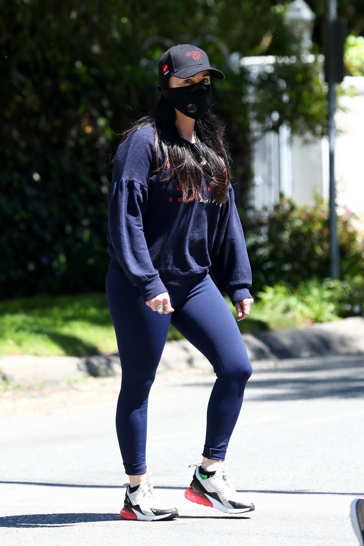 kyle richards wears a blue sweatshirt and leggings as she steps out for  walk with a friend in los angeles-110420_7