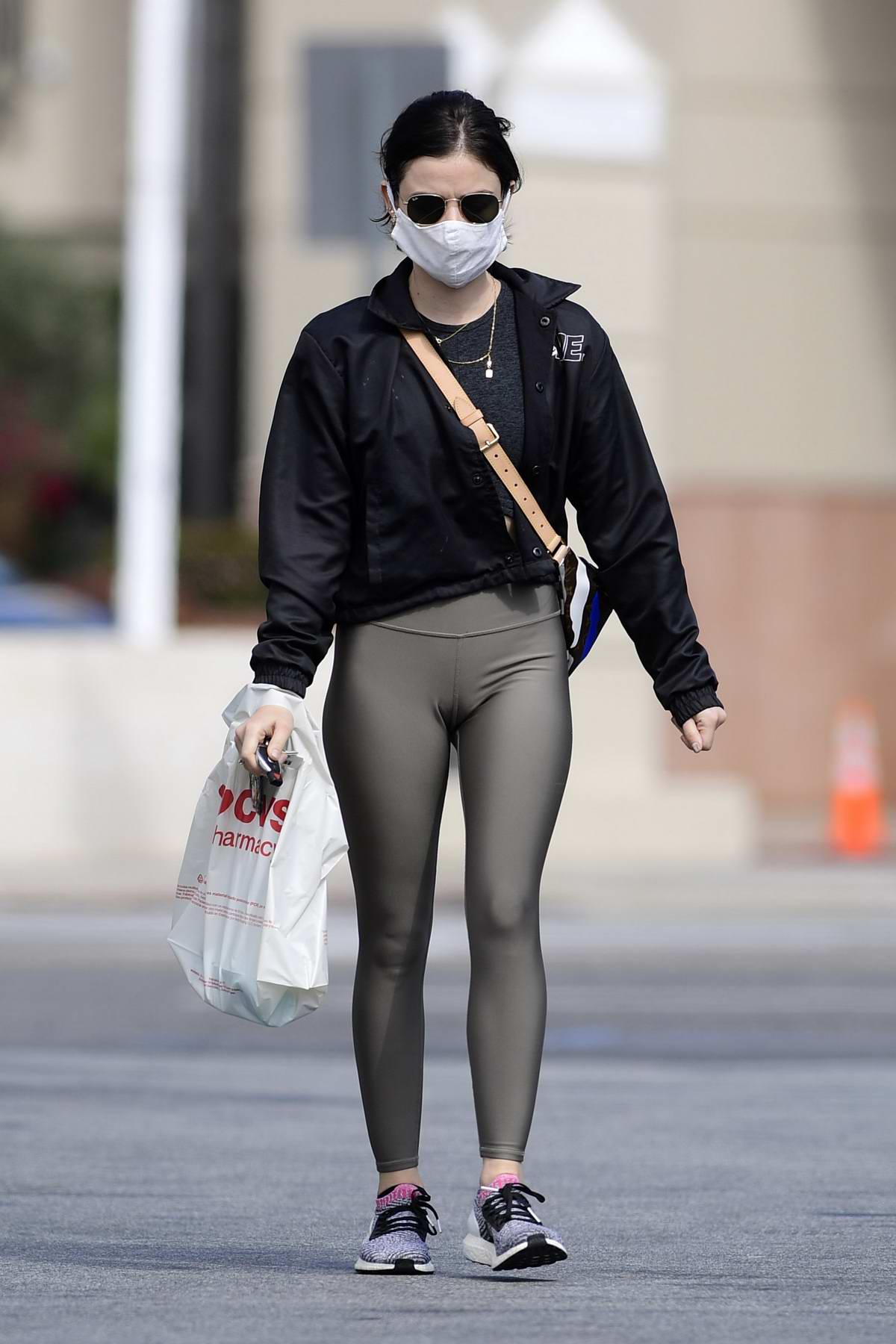 Lucy Hale wears her mask as she stops by a CVS in Los Angeles