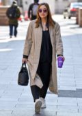 Myleene Klass looks fashionable in a Burberry coat as she arrives at Global Radio Studios in London, UK