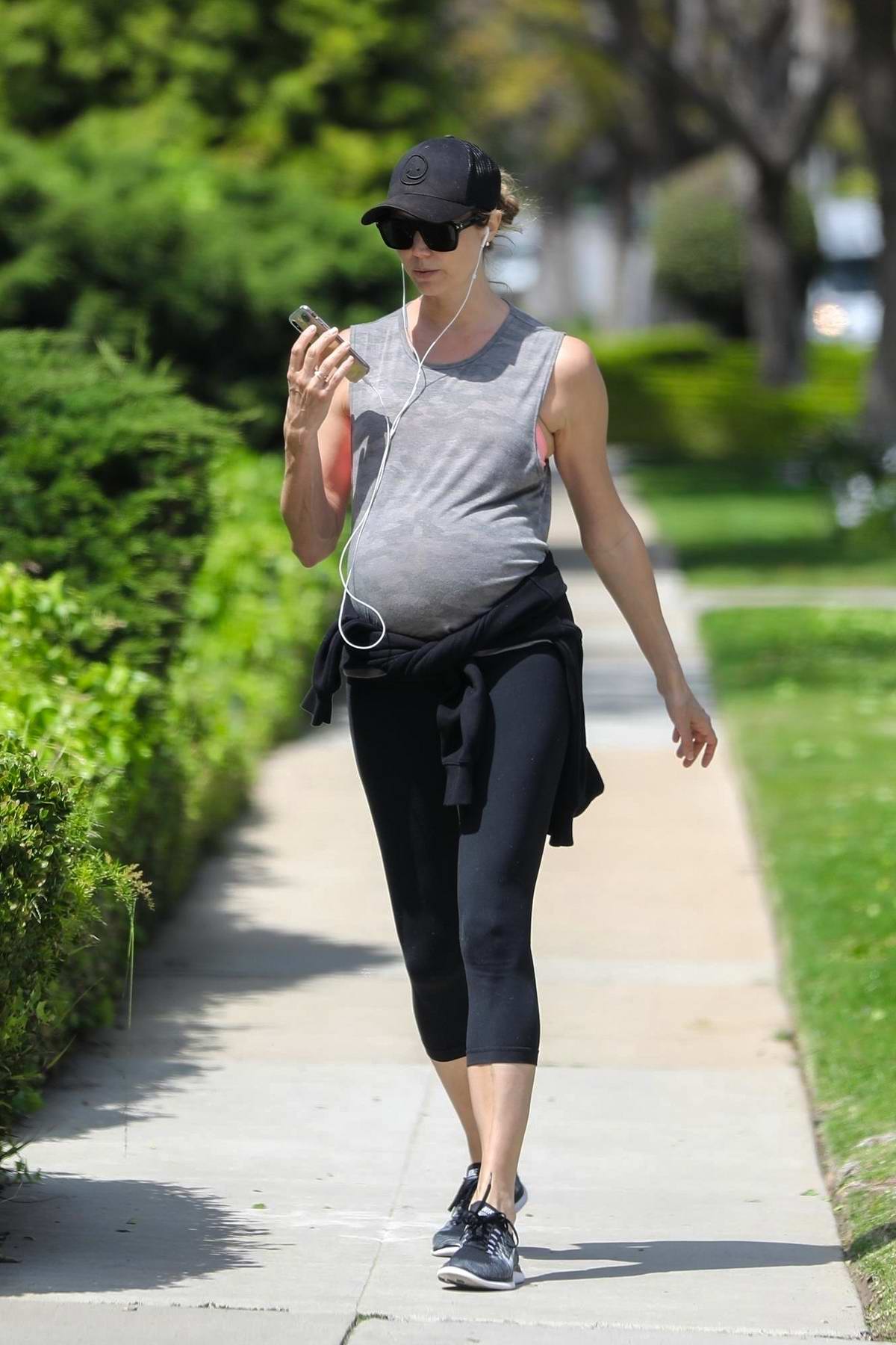 stacy keibler shows off her baby bump as she steps out for a walk
