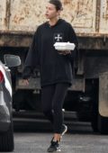 Georgia Fowler sports a black hoodie and leggings as she grab some food in Sydney, Australia