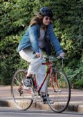 Lily James and Matt Smith go for a bike ride together on a sunny day in North London, UK