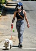 Lucy Hale shows off her fit figure as she goes on a walk with her dog Elvis in Studio City, California