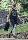 Malin Akerman wears a tank top and leggings as she walks her dog in Los Feliz, California