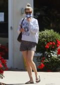 Mia Goth sports a sweatshirt and shorts while shopping for potted flower plants in Pasadena, California