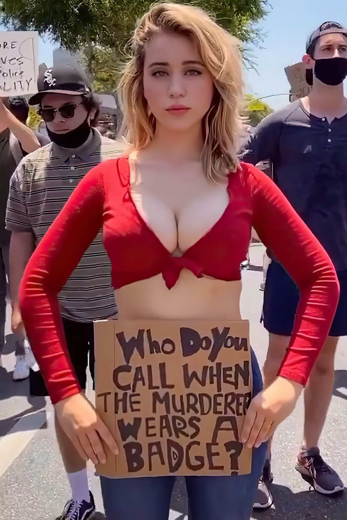 Caylee Cowan joins the peaceful protest with friends in Los Angeles
