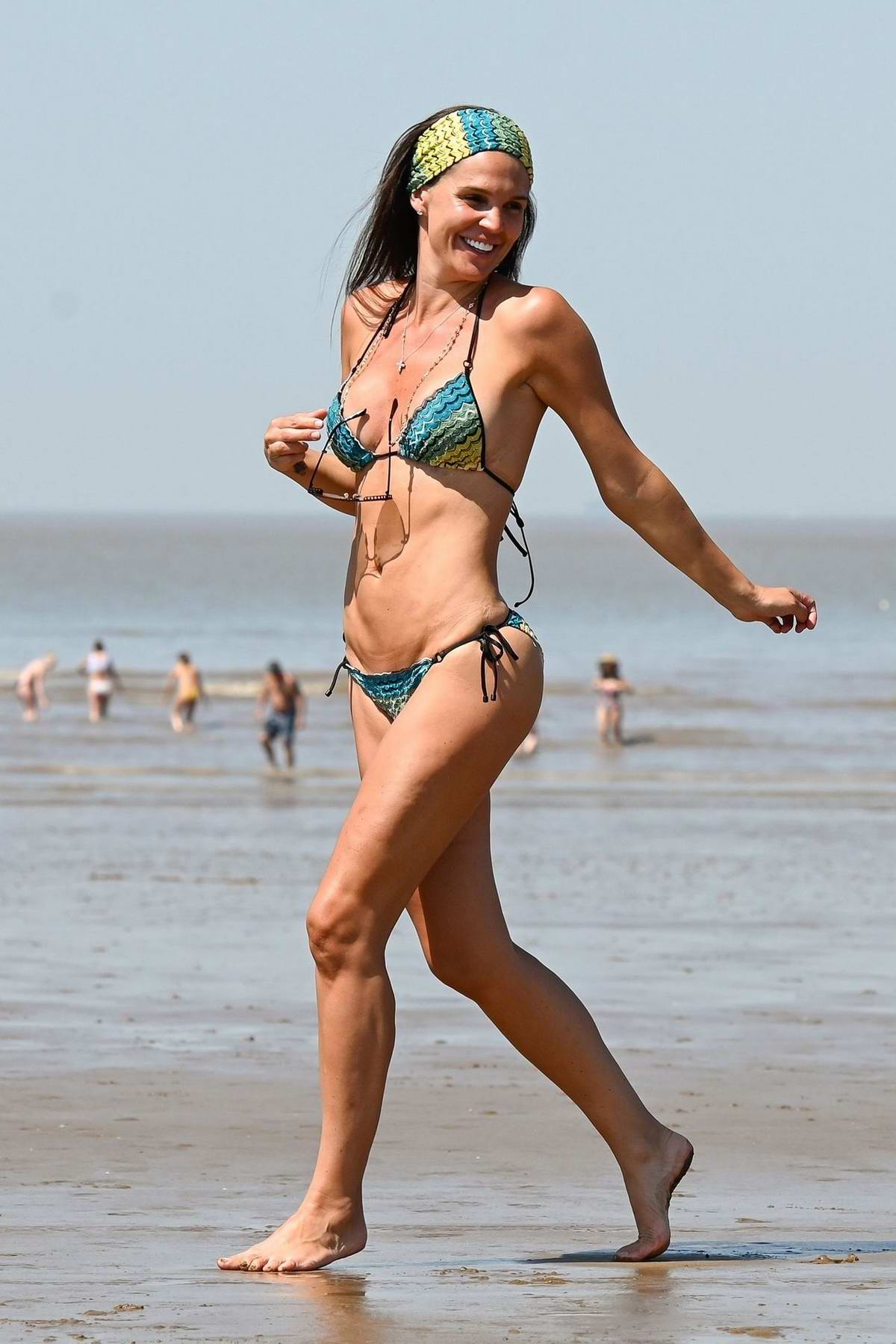 Danielle Lloyd shows off her bikini body on the hottest day of the year at Weston-super-Mare beach, UK