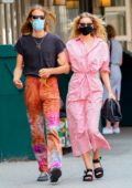 Elsa Hosk is pretty in pink while out for a walk with Tom Daly in New York City