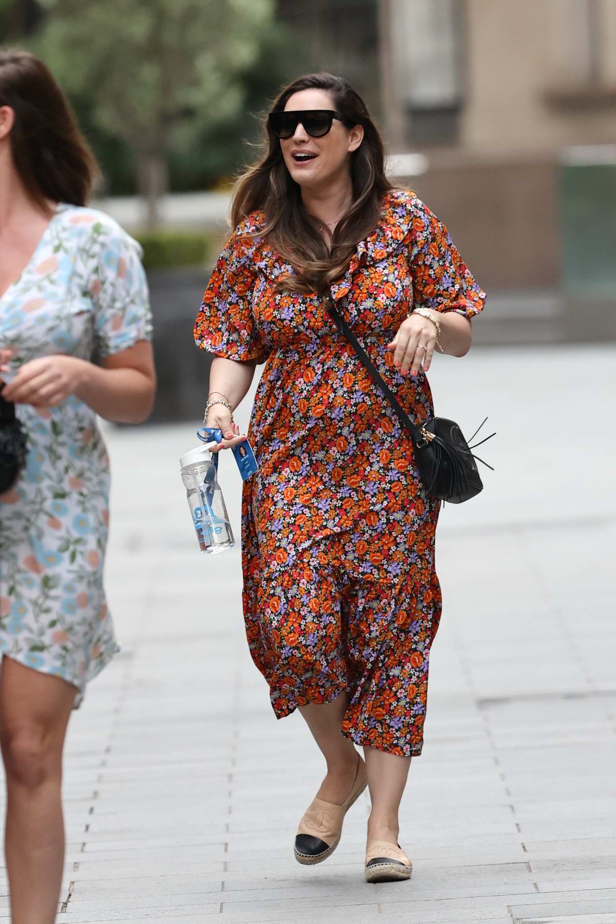 Kelly Brook is all smiles as she leaves Heart Radio in a colorful ...