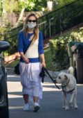 Olivia Wilde wears a stylish mask as she walks her dog in her Los Angeles
