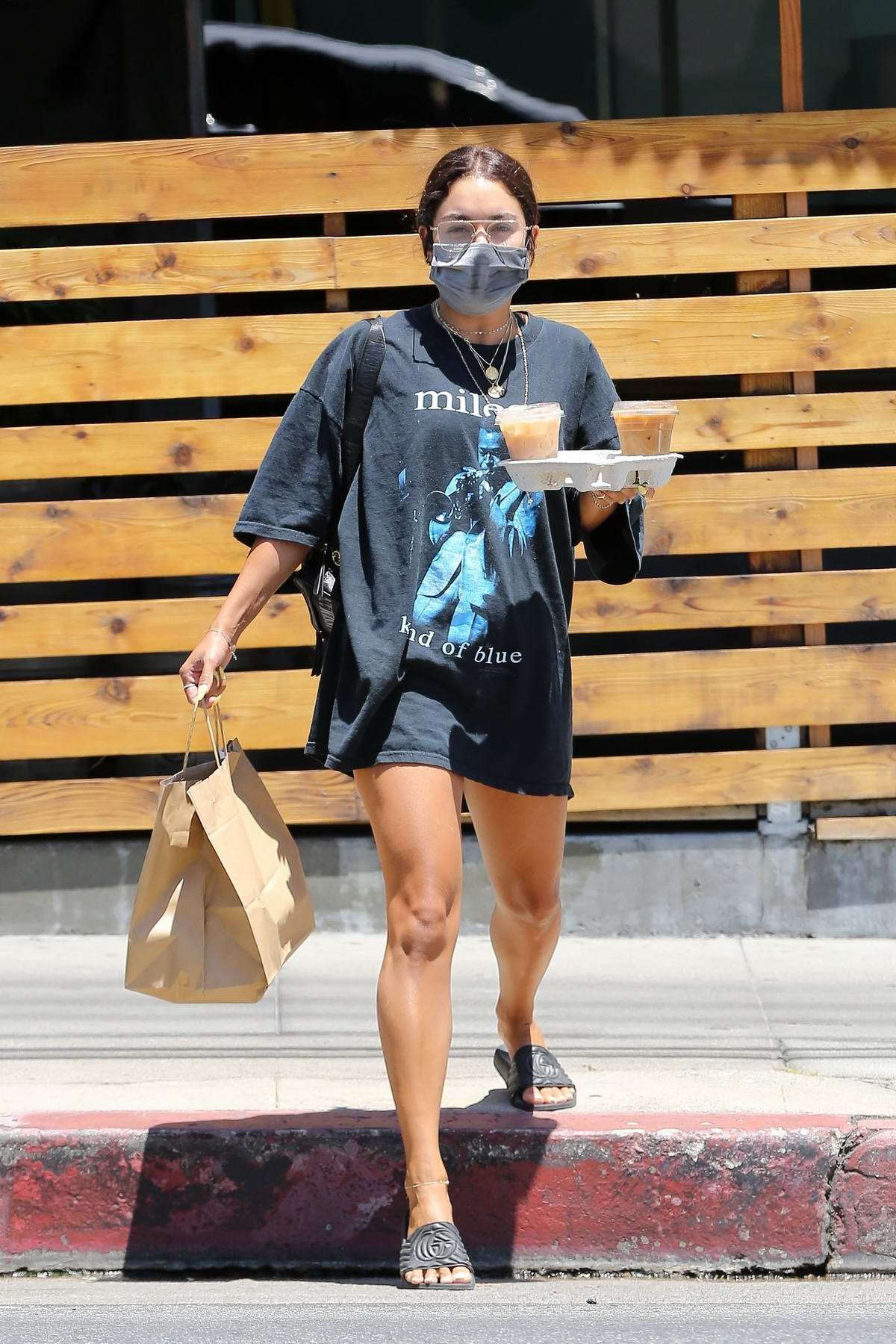 Vanessa Hudgens Dons An Oversized T Shirt And Shorts As She Grabs Some Food And Coffee In Los