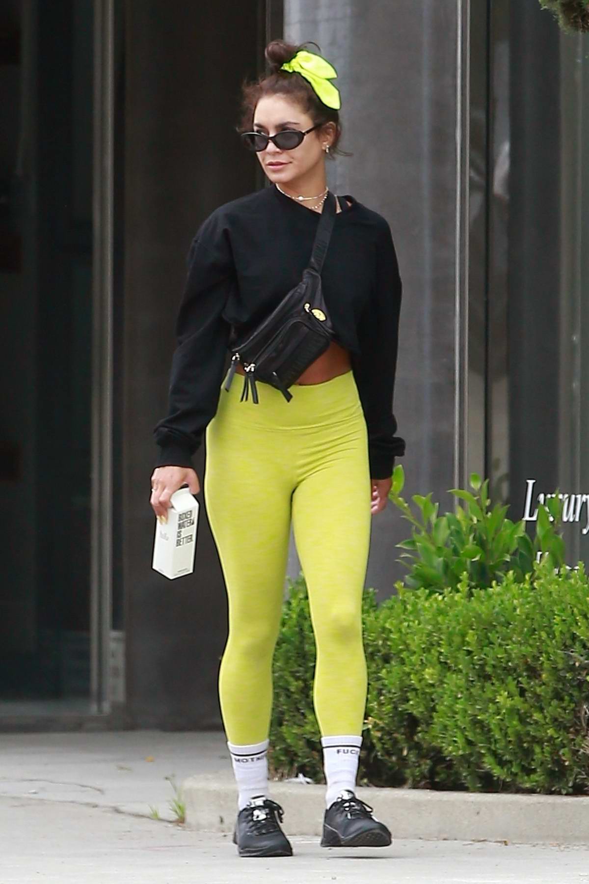 Vanessa Hudgens Shows Off Her Toned Legs In Green Leggings While Making 