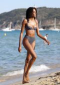 Cindy Bruna wears gingham pattern bikini while enjoying a day with her sister at Verde Beach in Saint-Tropez, France