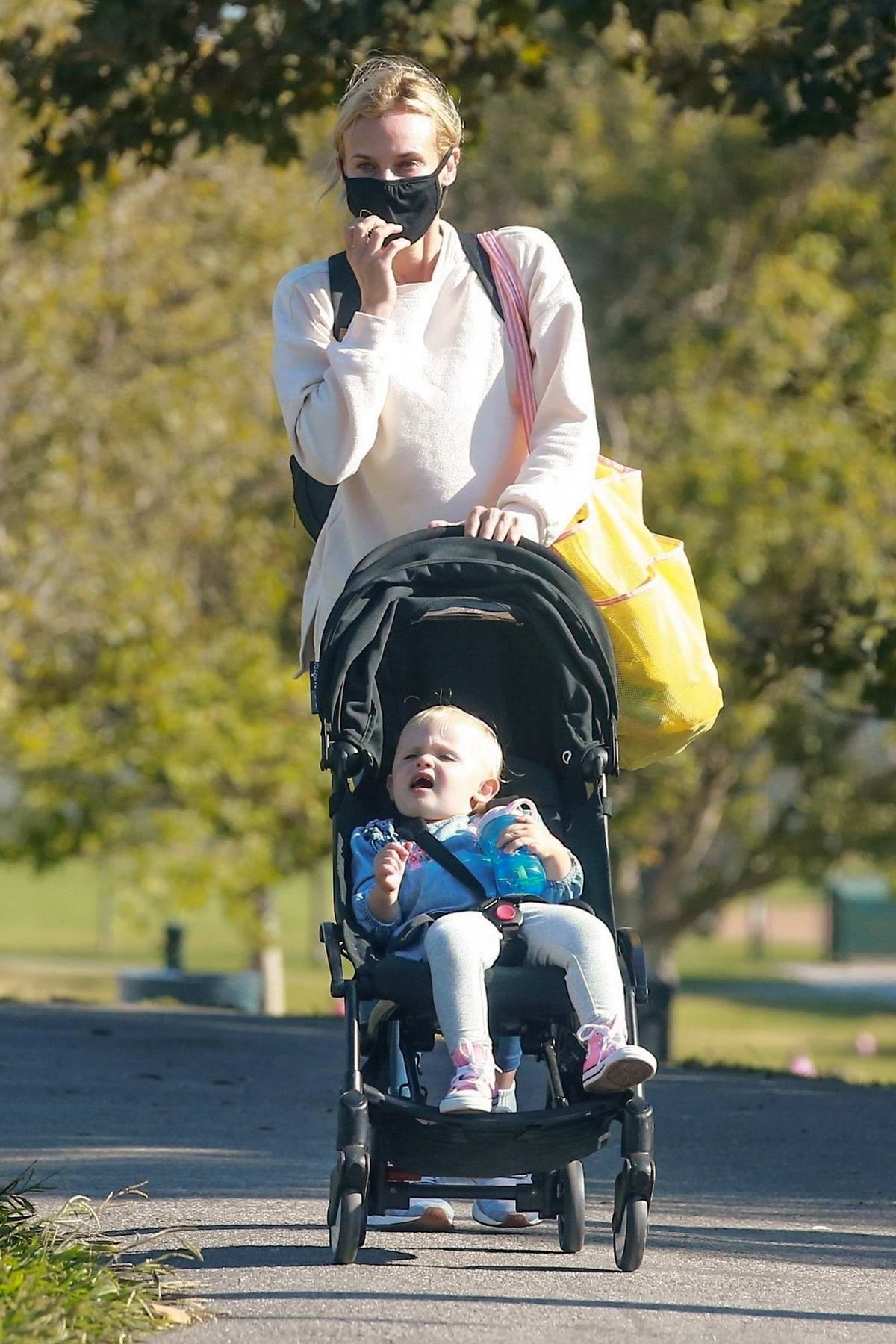 Diane Kruger twins with her one-year-old daughter for park trip